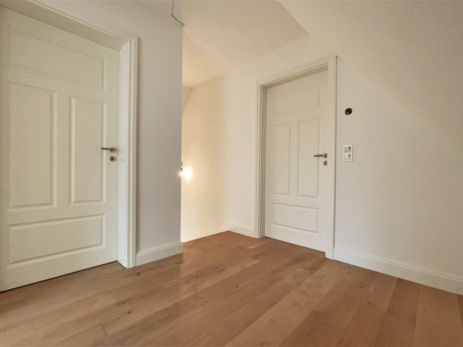 (22) Der ansprechende Flurbereich im Spitzboden (Archivbild) Etagenwohnung Bottrop-Feldhausen