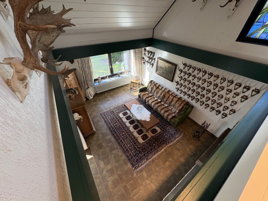 (28) Der Blick aus dem Obergeschoss in den Kaminwohnzimmerbereich im Erdgeschoss Einfamilienhaus Bottrop / Grafenwald